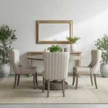 Load image into Gallery viewer, Beige upholstered dining chairs with wooden legs French style shabby chic formal dining room.