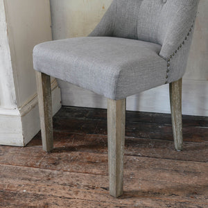 Grey, padded dining chair