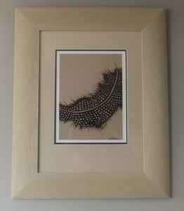 A Gineau Fowl feather Print in a Cream Frame "Empathy" by Kerrie Griffin-Rogers 