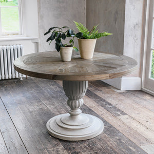 Round dining table with charcoal base