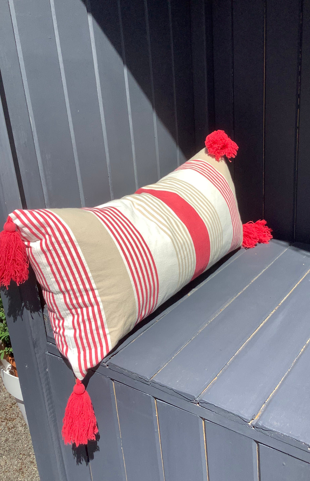 Red Striped Long Cushion with Red Tassels Lindum