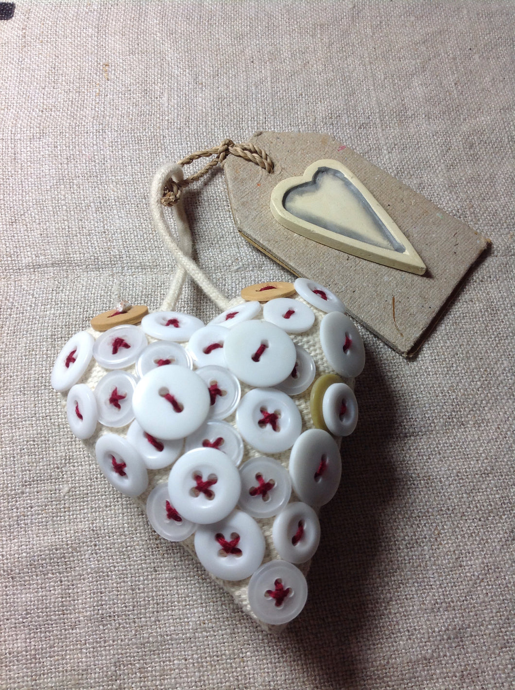 Cream hanging decoration heart with handmade pearl buttons